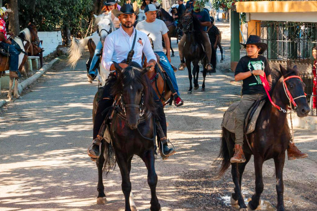 A group of guests riding horses